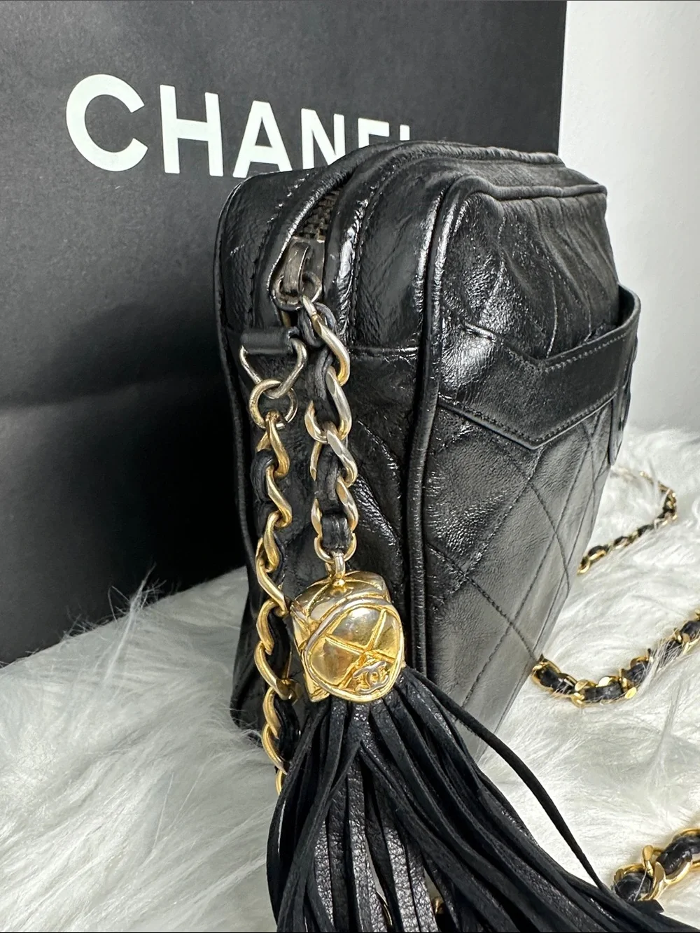CHANEL Black Quilted Lambskin Crossbody with Tassel and Chain
